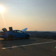 An overly dramatic photo showing off the MR2's engine bay, as well a its trunk and frunk.